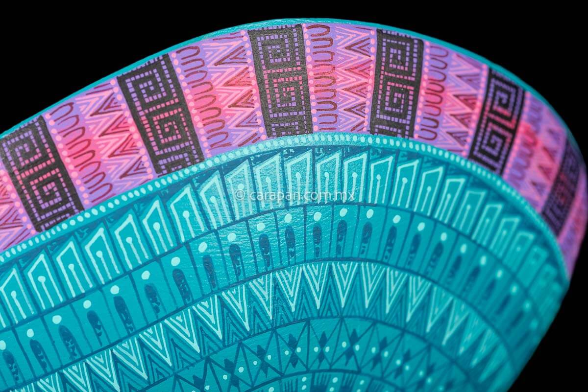 Axolotl Oaxacan wood carving decorated with zapotec symbols in a turquoise & Fucsia palette tail