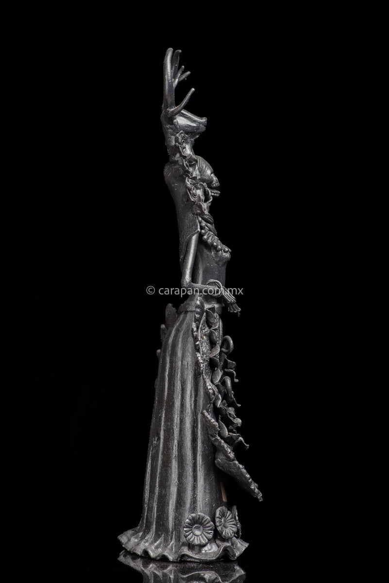Day of the dead Sculpture Black Catrina  with deer head dress and pastillage flowers on her skirt Side