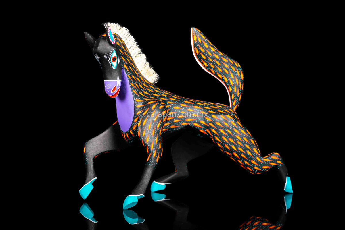 Black Horse Mexican Wood Carving Alebrije hand painted in red with orange strokes