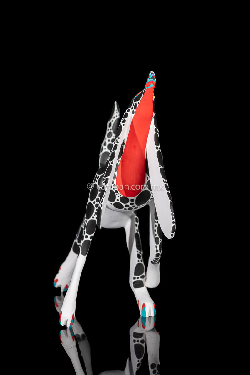 Mexican Wood Carving Alebrije Walking Dog in White with black dots