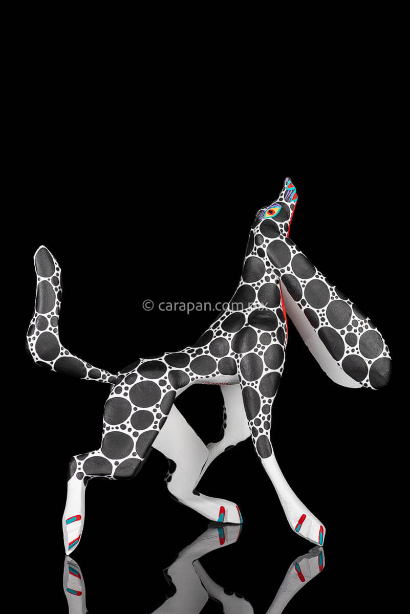 Mexican Wood Carving Alebrije Walking Dog in White with black dots
