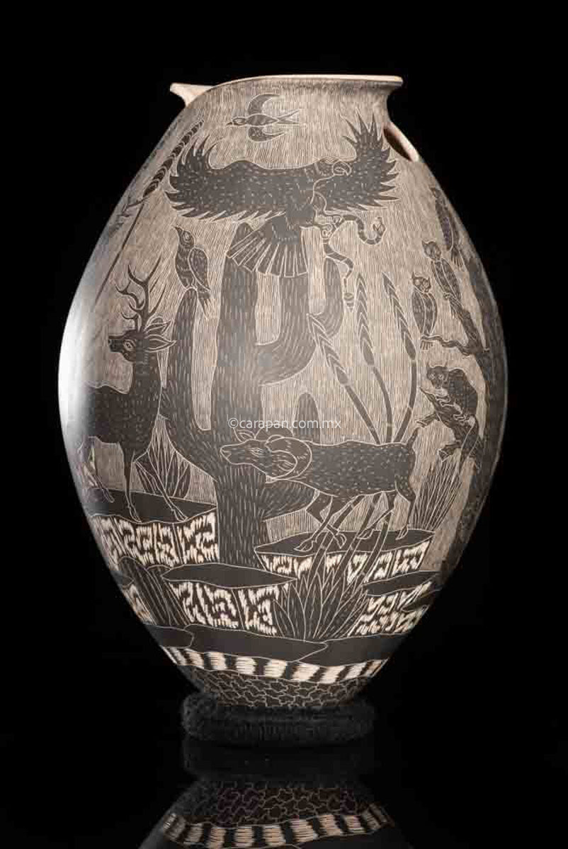 Mata Ortiz Ceramic Pot with desert and mountain animals in black over beige crafted with sgraffito technique.