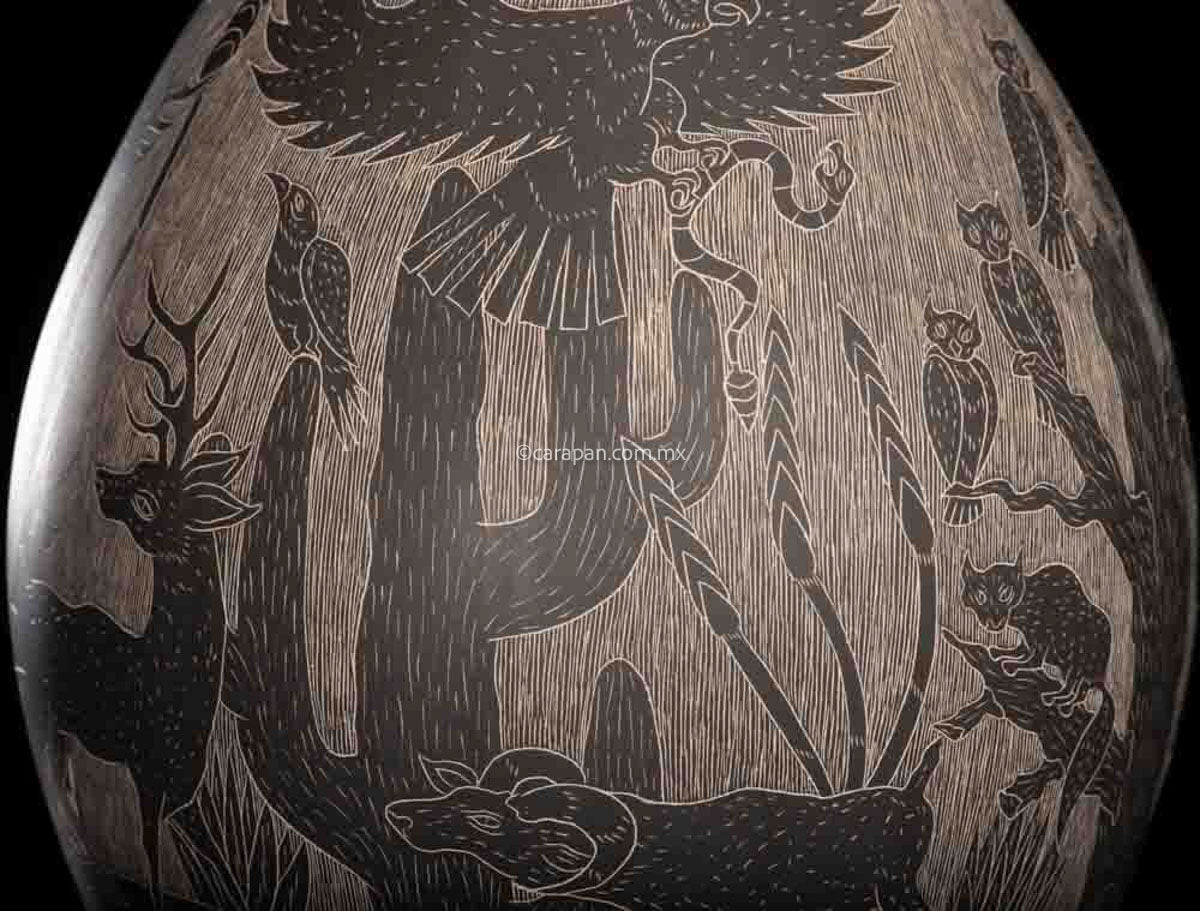 Mata Ortiz Ceramic Pot with desert and mountain animals in black over beige crafted with sgraffito technique.