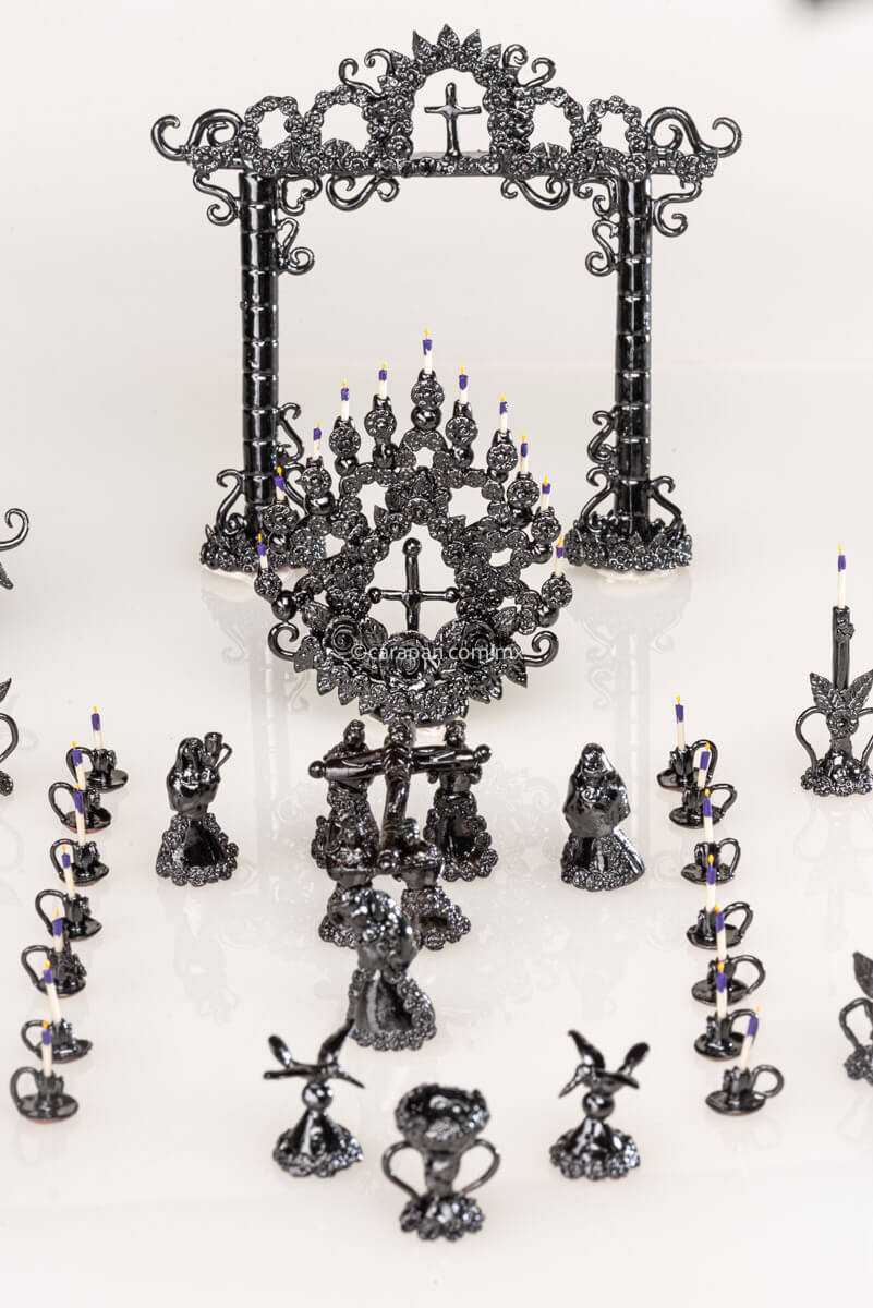 Set of Miniature glazed clay candelabra and via crucis