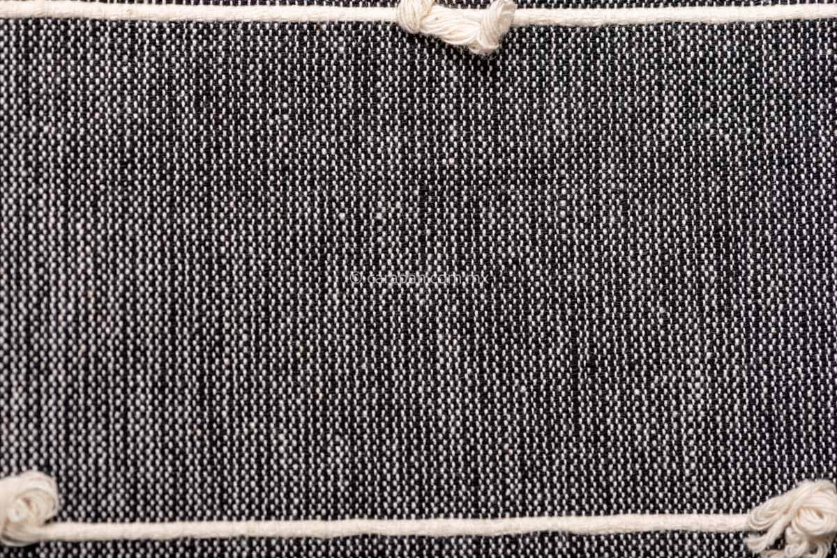 Set of 2 rectangular gray cushion covers in gray over beige jaspe and three beige horizontal stripes. Pedal loomed in Oaxaca