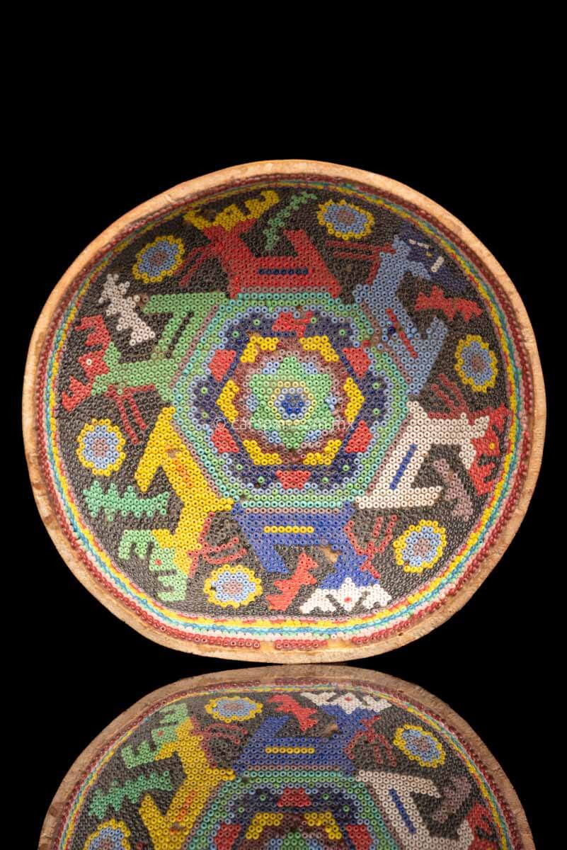 Vintage Huichol Beaded Gourd with Peyote Symbol at the center and 6 deer around it. Crafted with glass beads applied to the gourd over a layer of bees wax with no previous design.