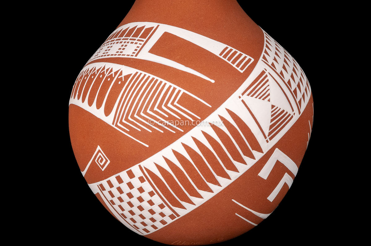 Orange Pot decorated with beige patterns
