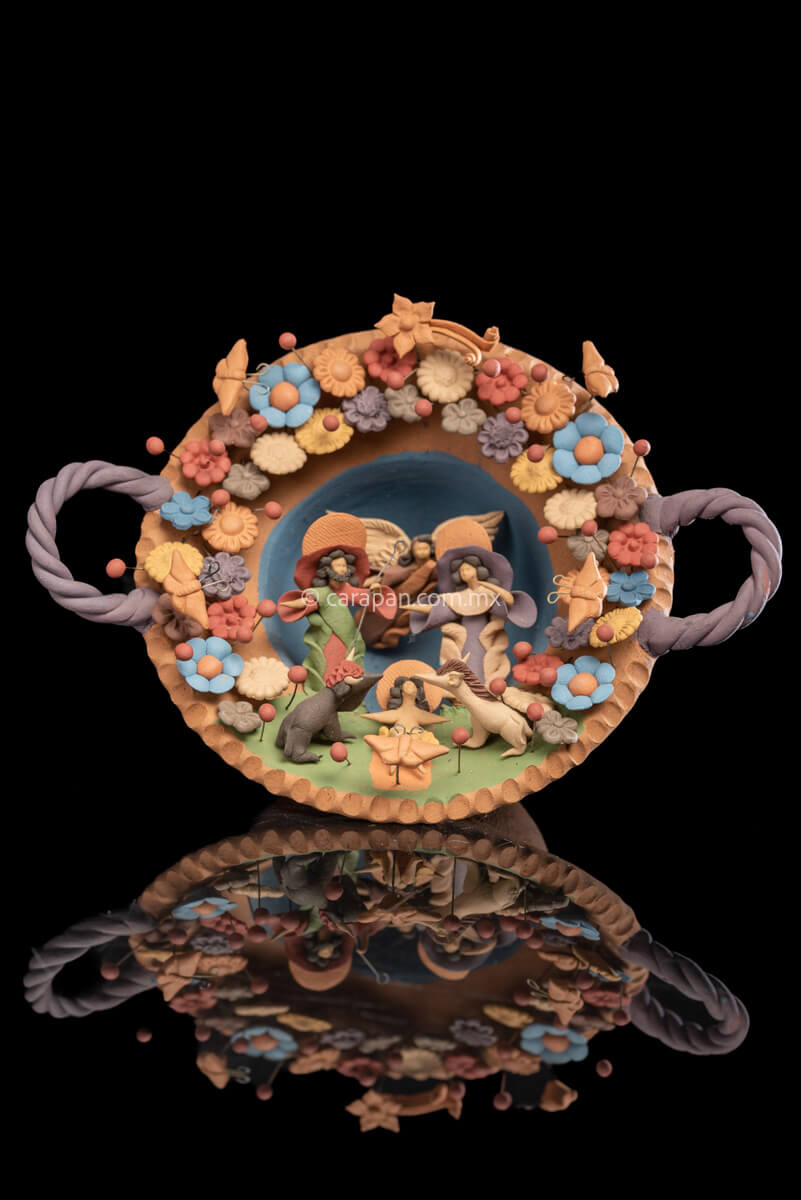 Miniature Nativity Set of Holly Family with St. Gabriel Archangel surrounded by butterflies & Flowers.