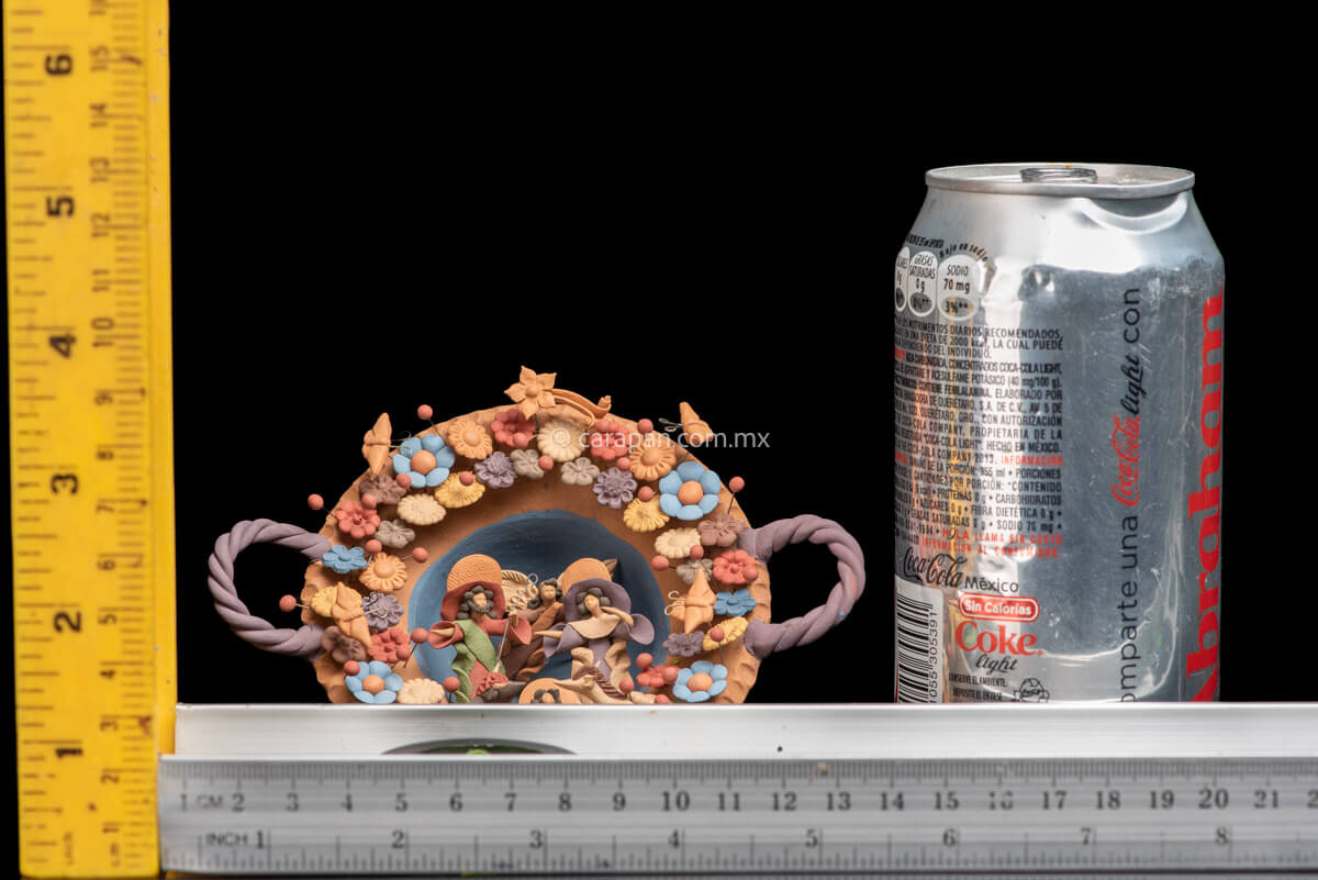 Miniature Nativity Set of Holly Family with St. Gabriel Archangel surrounded by butterflies & Flowers.