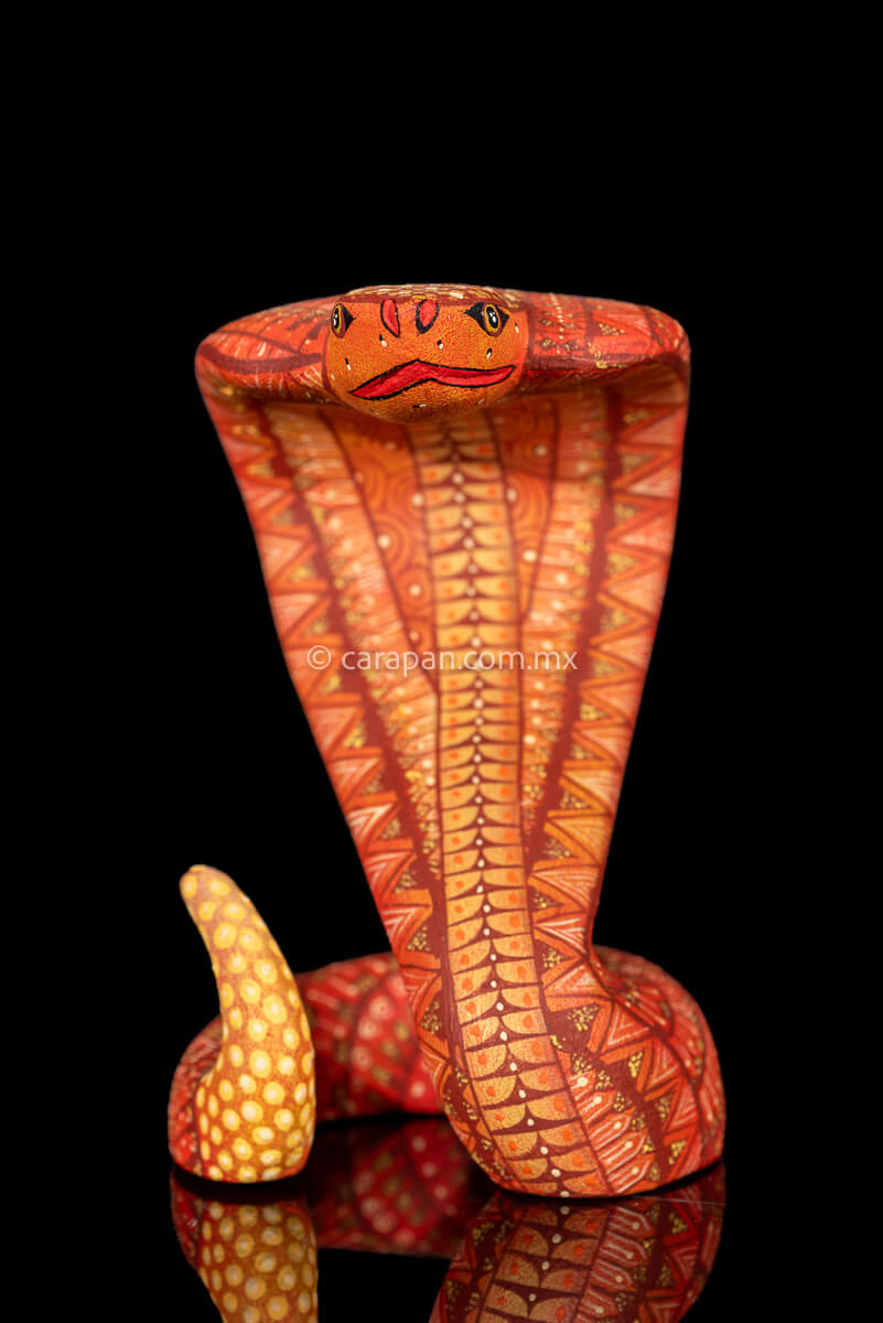 Cobra wooden sculpture alebrije hand crafted in Oaxaca, decorated with indigenous zapotec symbols