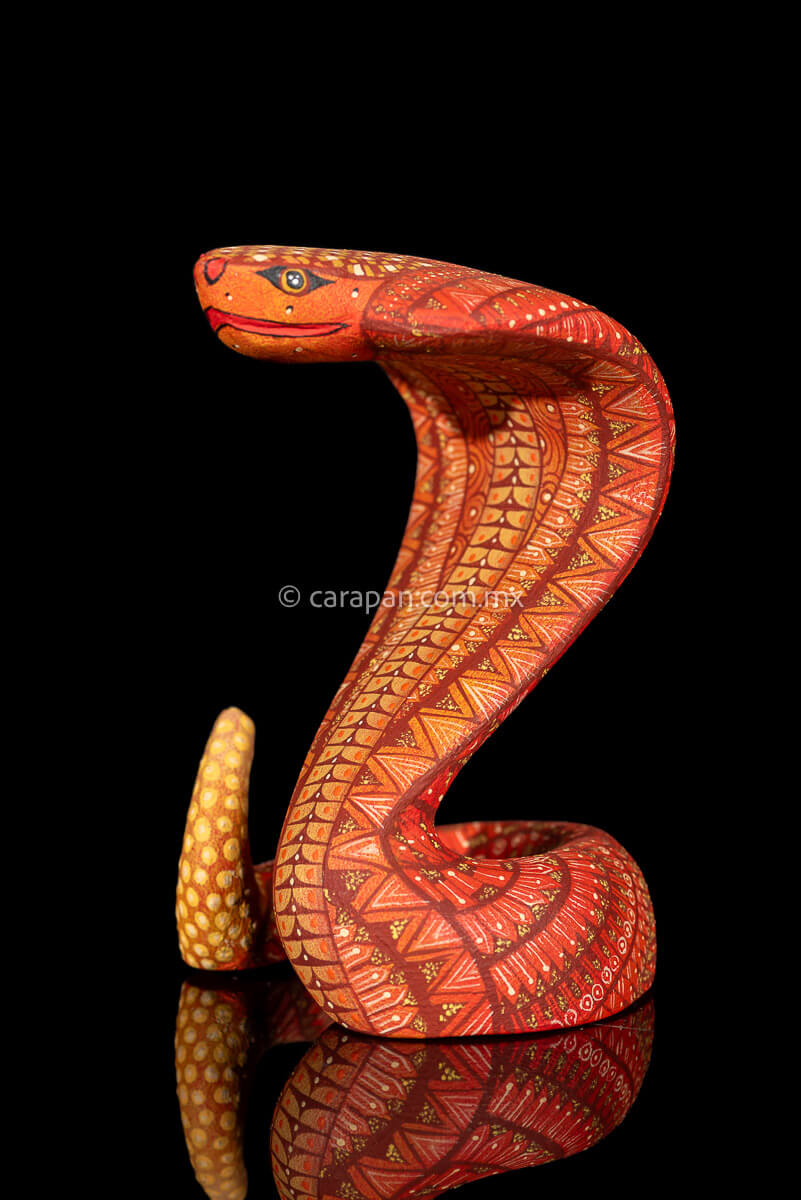 Cobra wooden sculpture alebrije hand crafted in Oaxaca, decorated with indigenous zapotec symbols