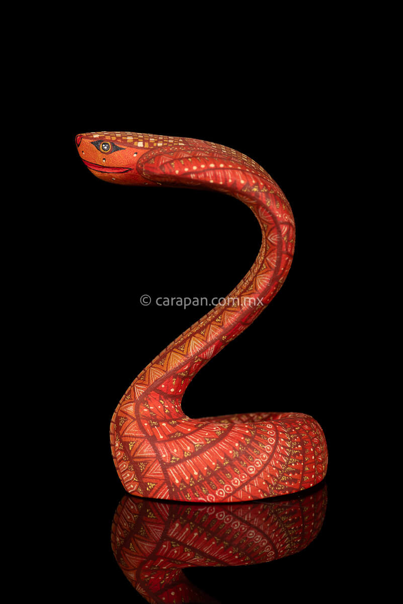 Cobra wooden sculpture alebrije hand crafted in Oaxaca, decorated with indigenous zapotec symbols