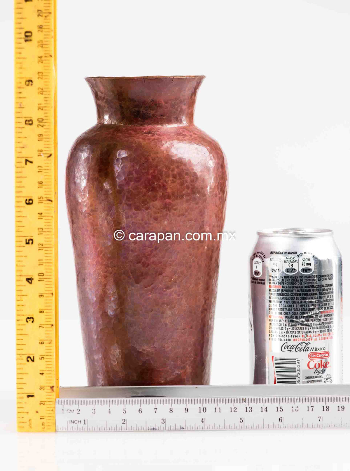 Tall round hammered copper pot folk art