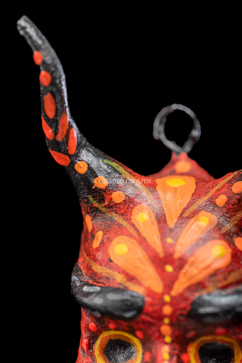 Paper Mache Smiling Devil with Moustache Painted in Red with orange strokes