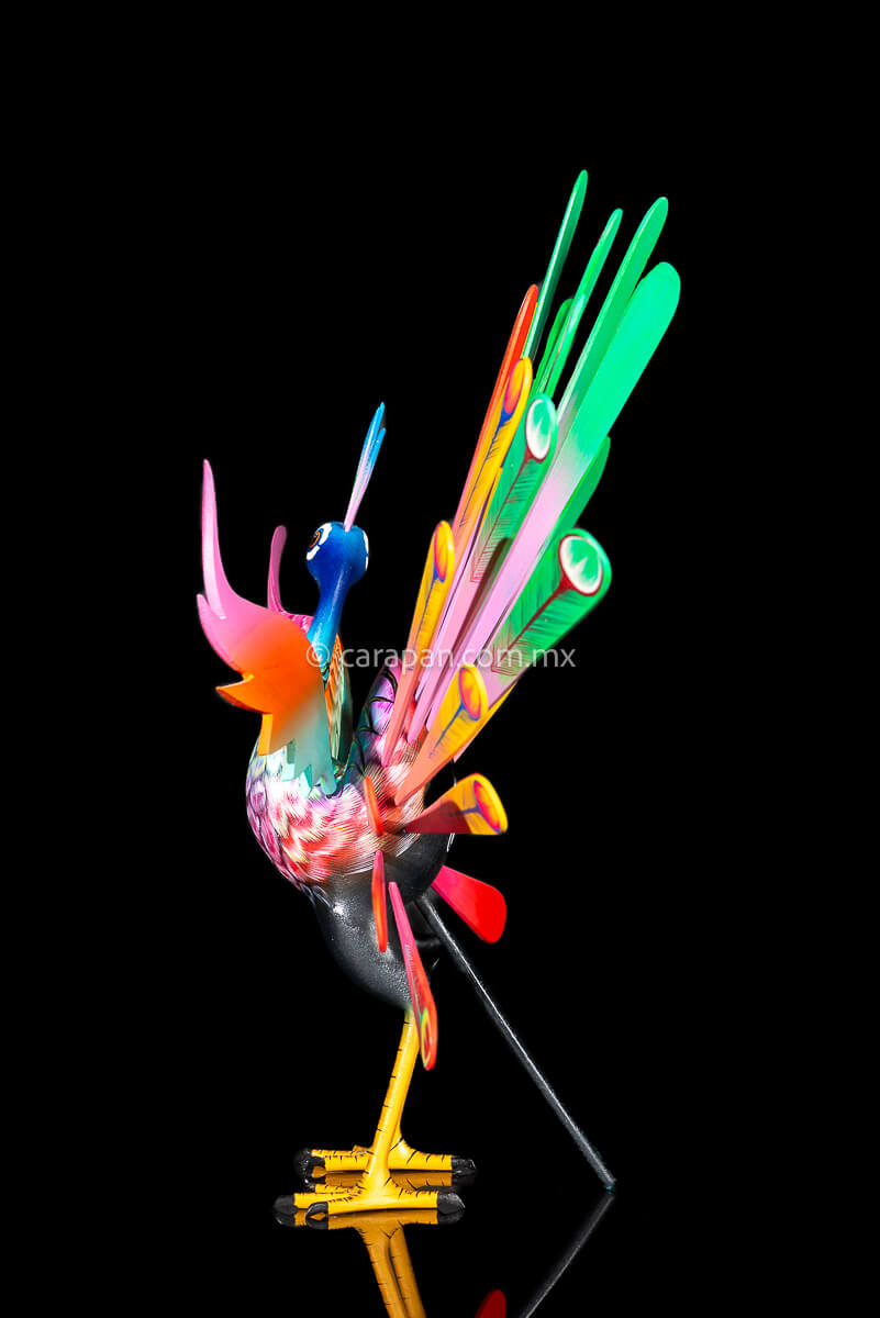 Peacock Wooden Sculpture Handcrafted in Oaxaca Mexico, hand painted displaying multiple colors wings& every feather are detachable