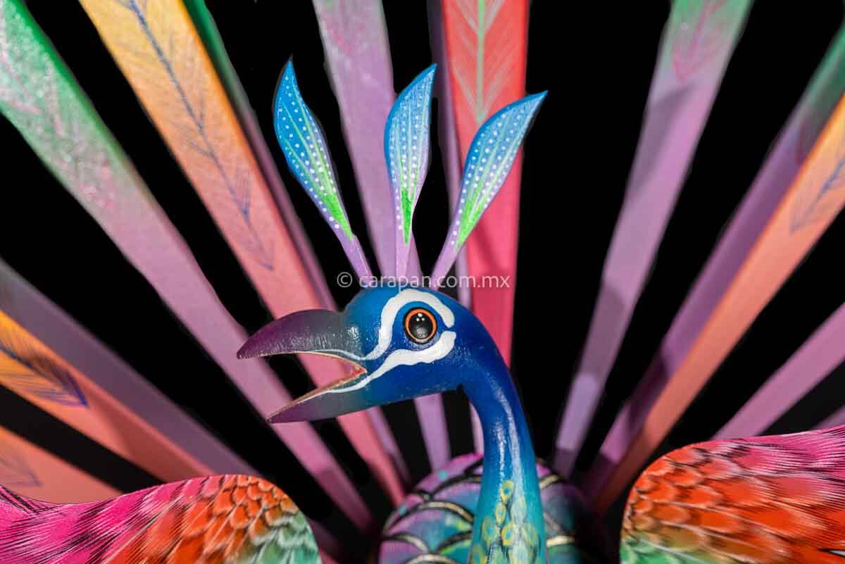 Head of Peacock Wooden Sculpture Handcrafted in Oaxaca Mexico, hand painted displaying multiple colors wings& every feather are detachable