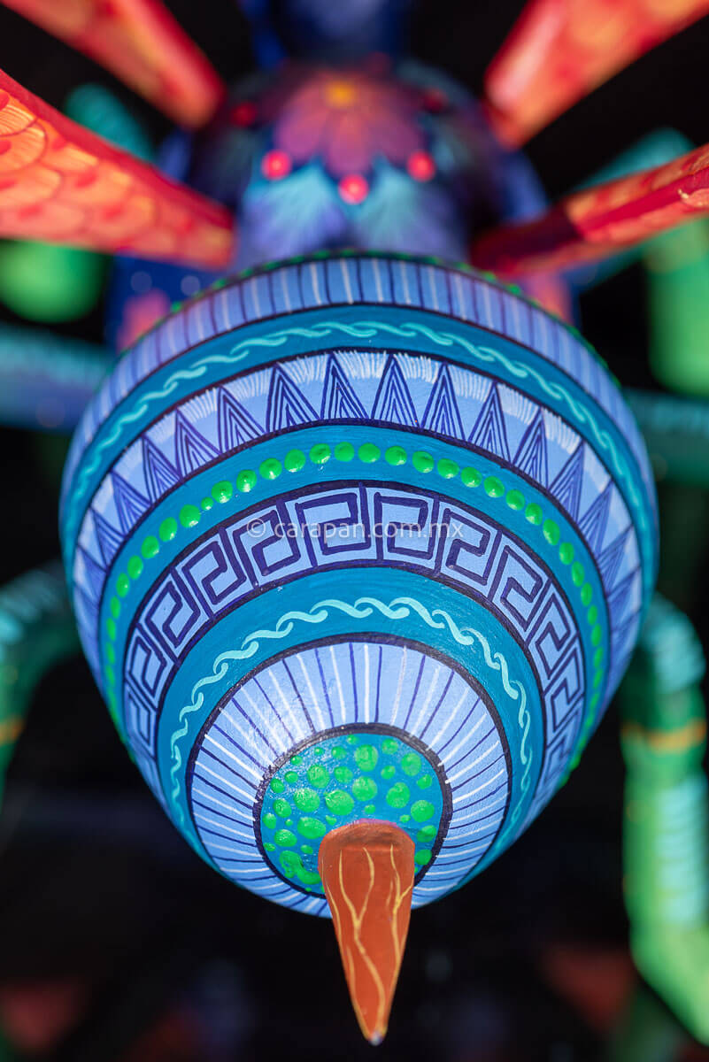 Tail of Wasp Alebrije Wooden Sculpture handcrafted in Oaxaca hand painted blue body & Orange detachable wings