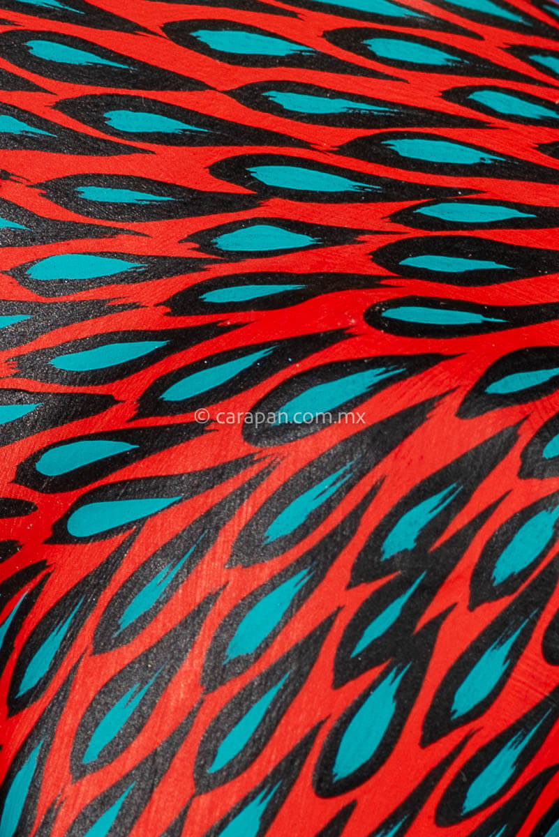 Red Horse Mexican Wood Carving Alebrije hand painted in red with green strokes. Detachable tail