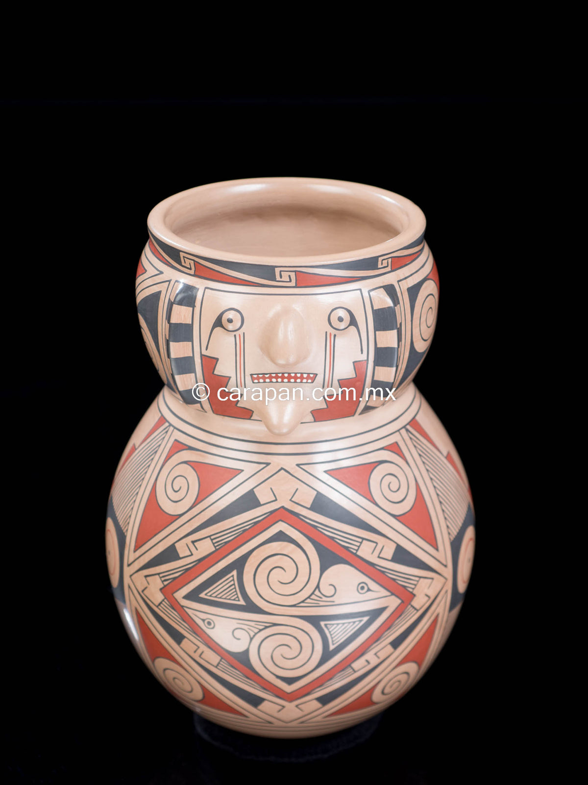 Mata Ortiz pot with human faces from Chihuahua Mexico