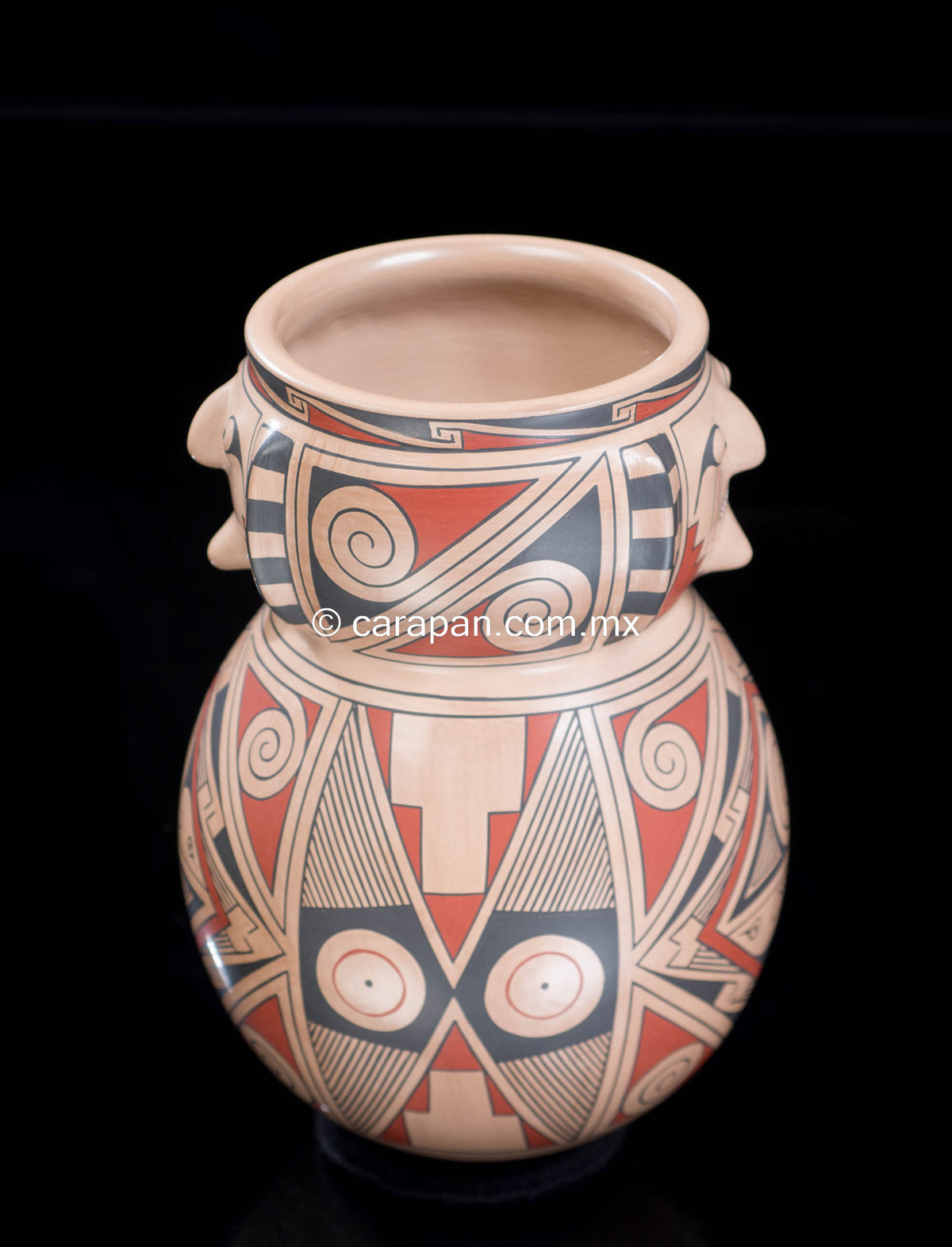 Mata Ortiz pot with human faces from Chihuahua Mexico