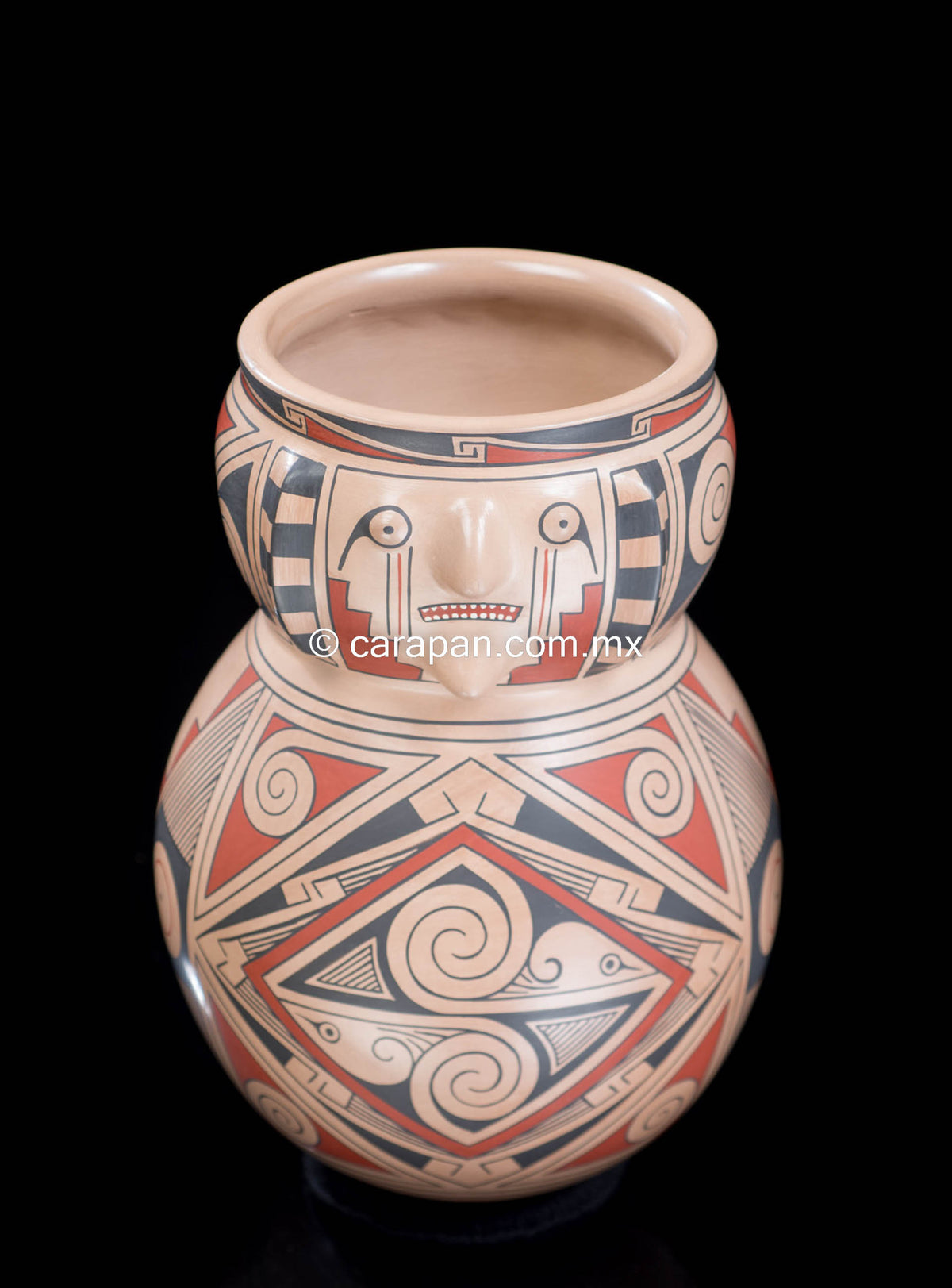 Mata Ortiz pot with human faces from Chihuahua Mexico