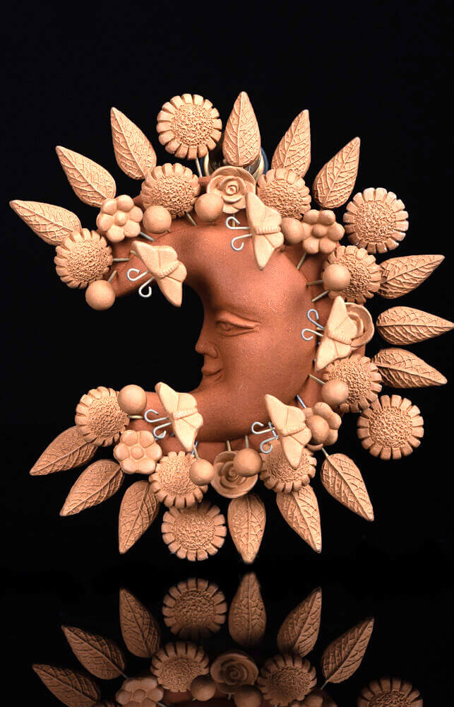 natural-clay-moon-sculpture