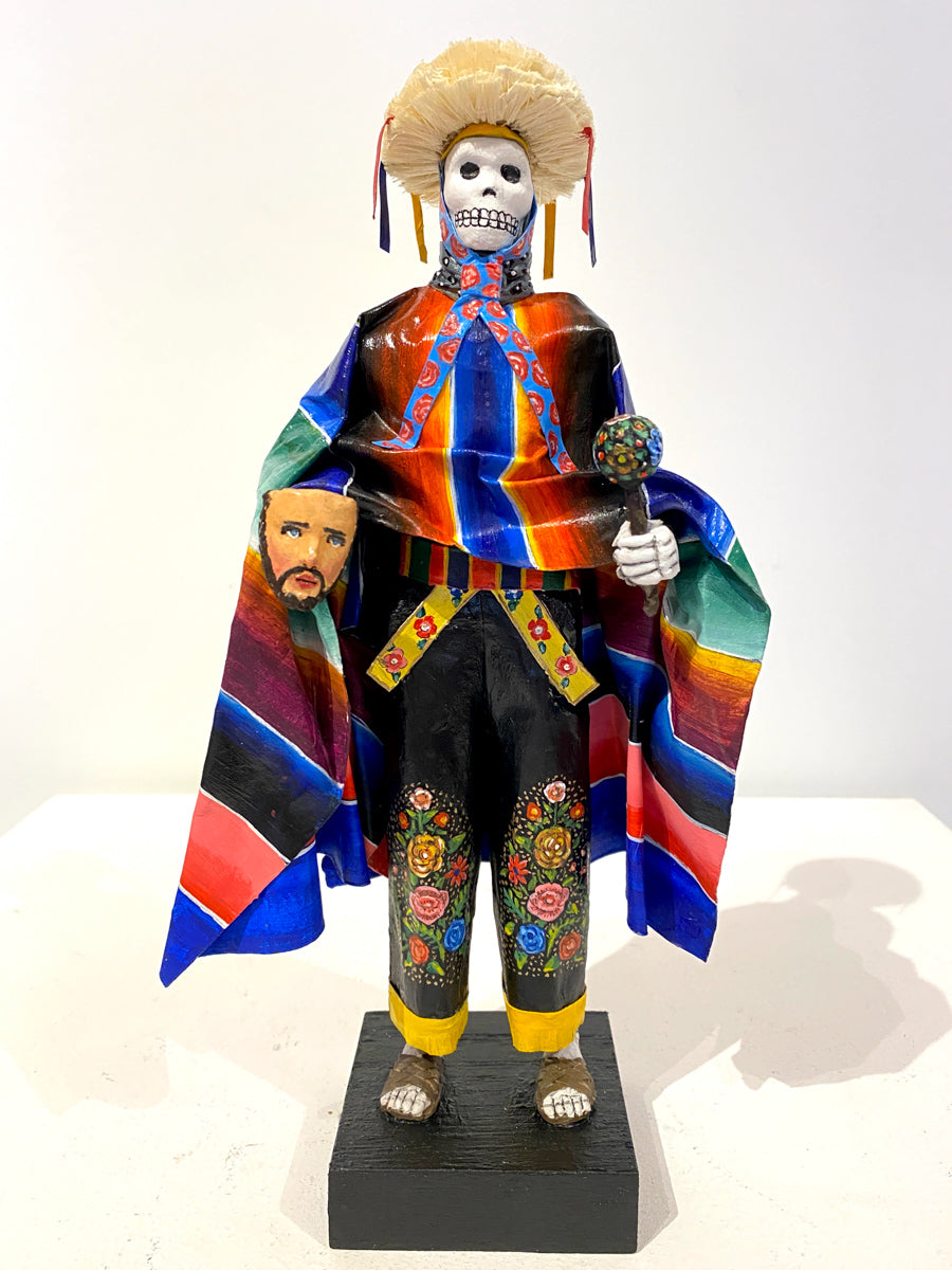 Day of the dead paper mache sculpture. Parachicos Mexican Dance.