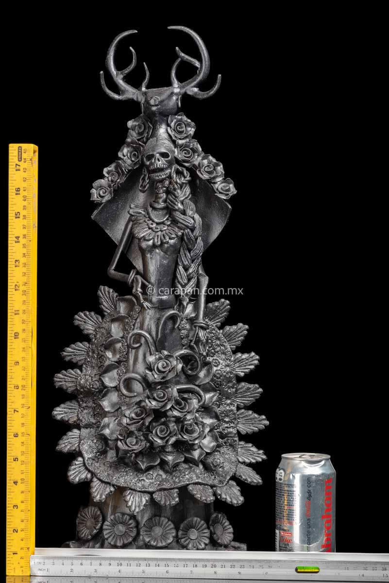 Day of the dead Sculpture Black Catrina  with deer head dress and pastillage flowers on her skirt rulers