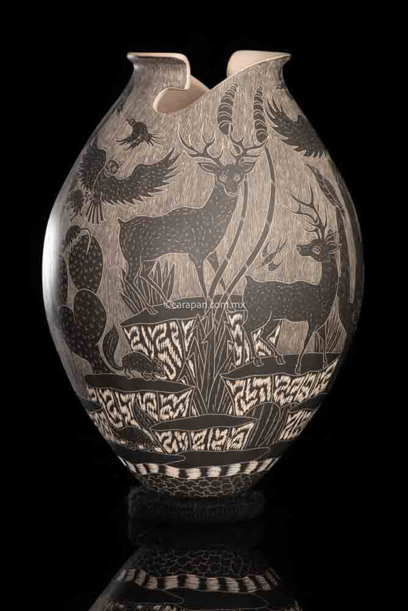 Mata Ortiz Ceramic Pot with desert and mountain animals in black over beige crafted with sgraffito technique.