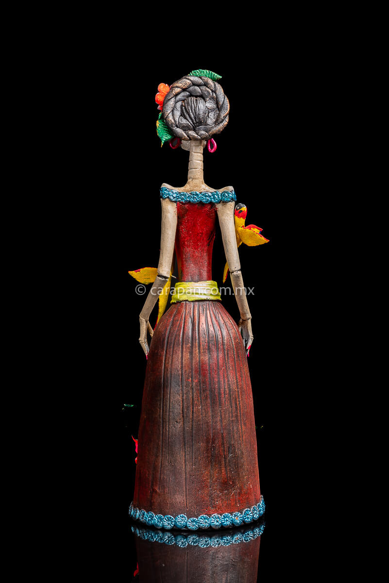 Mexican Clay catrina with parrots and flowers head dress inspired by frida kahlo's style back