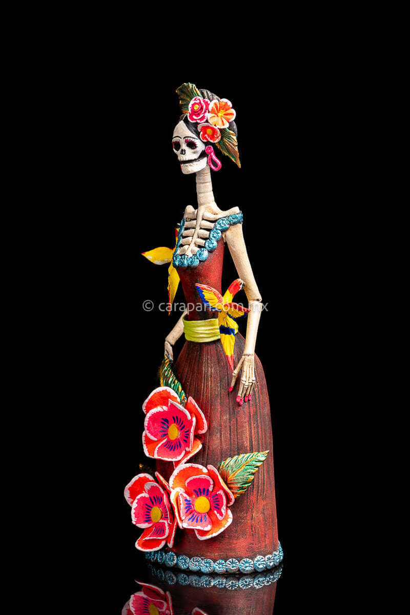 Mexican Clay catrina with parrots and flowers head dress inspired by frida kahlo's style side