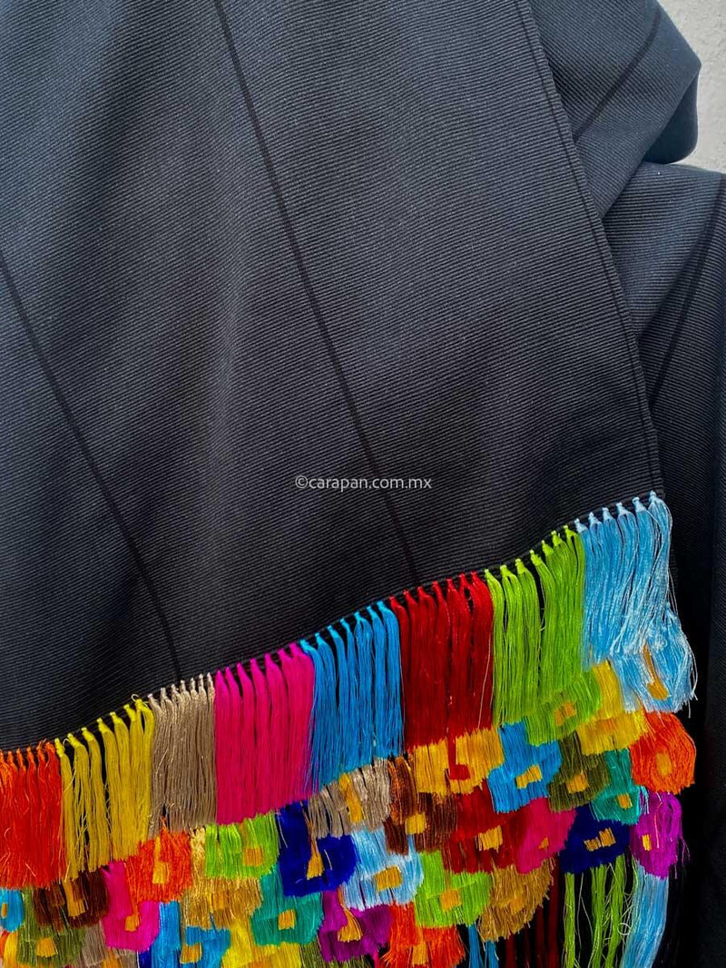 Fine indigenous textile backstrap loomed. Black  cotton Shawl (rebozo) with black over black stripes and  multi colored rayon fringe