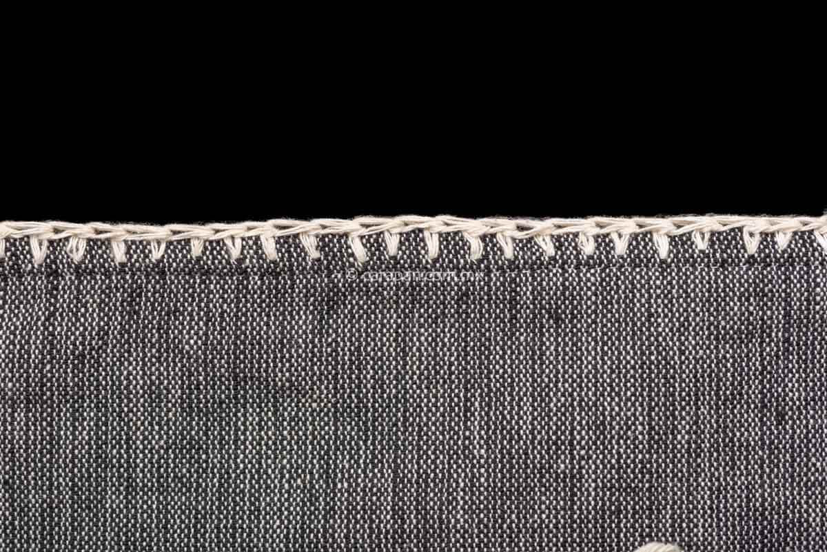 Set of 2 rectangular gray cushion covers in gray over beige jaspe and three beige horizontal stripes. Pedal loomed in Oaxaca