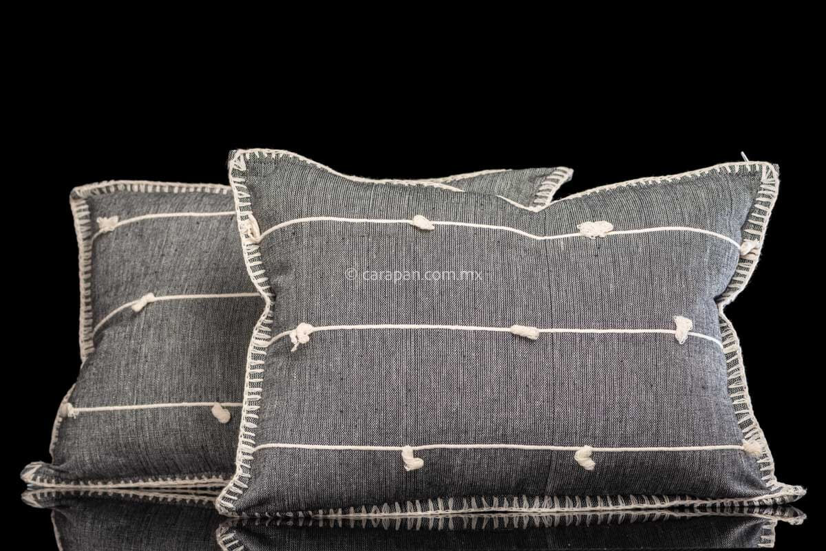Set of 2 rectangular gray cushion covers in gray over beige jaspe and three beige horizontal stripes. Pedal loomed in Oaxaca