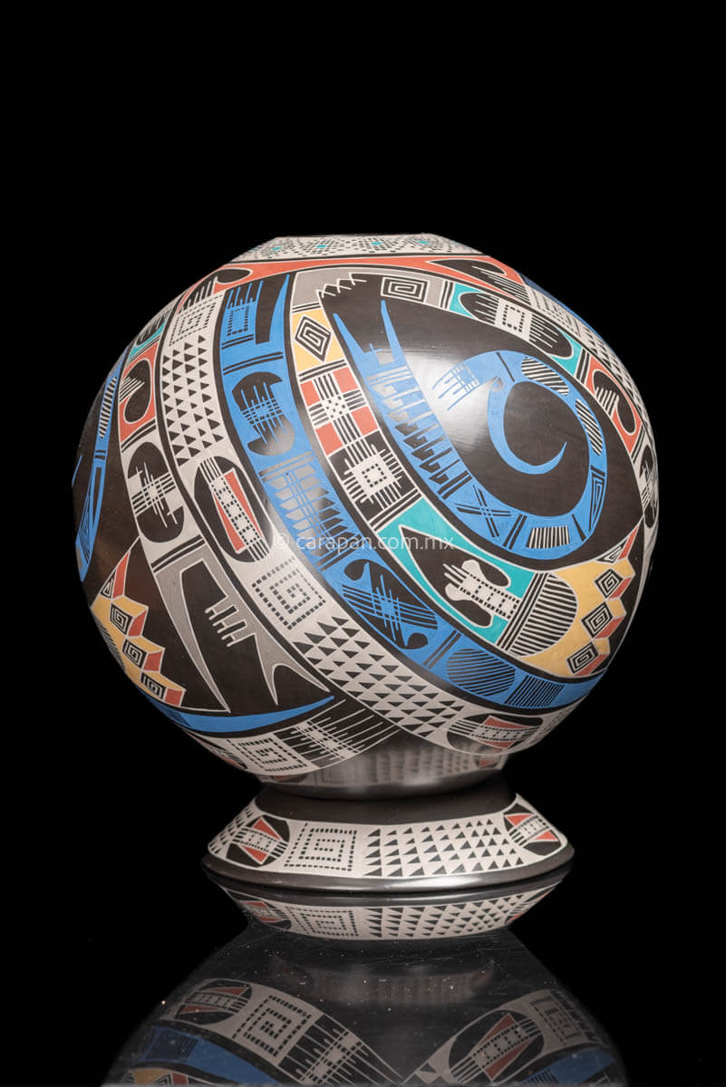 Mata Ortiz Ceramic Spheric Pot with Swirl Pattern.