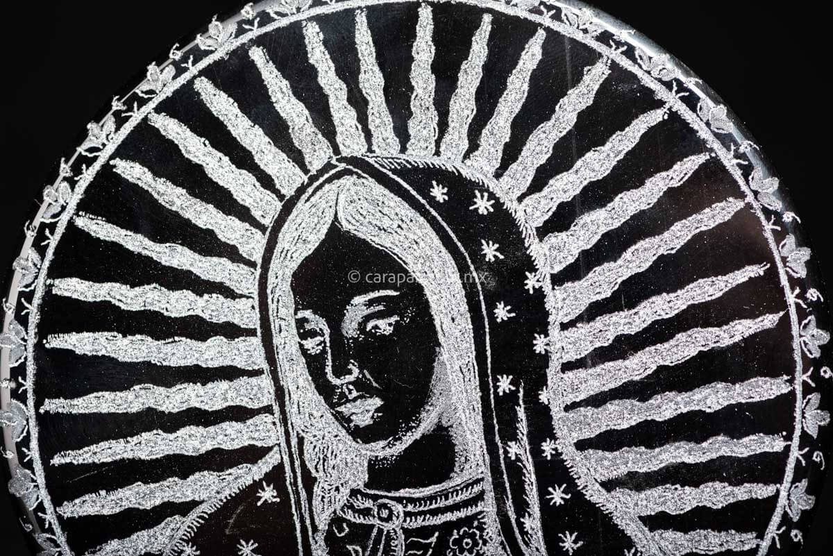  Engraved Obsidian disc with face of Virgin of Guadalupe