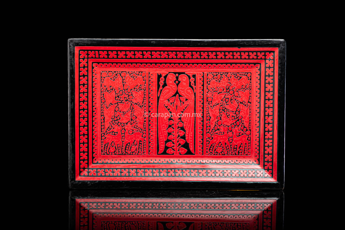 Lacquered Tray etched in red over black with three panels one with two parrots at the center and two with animals on each side