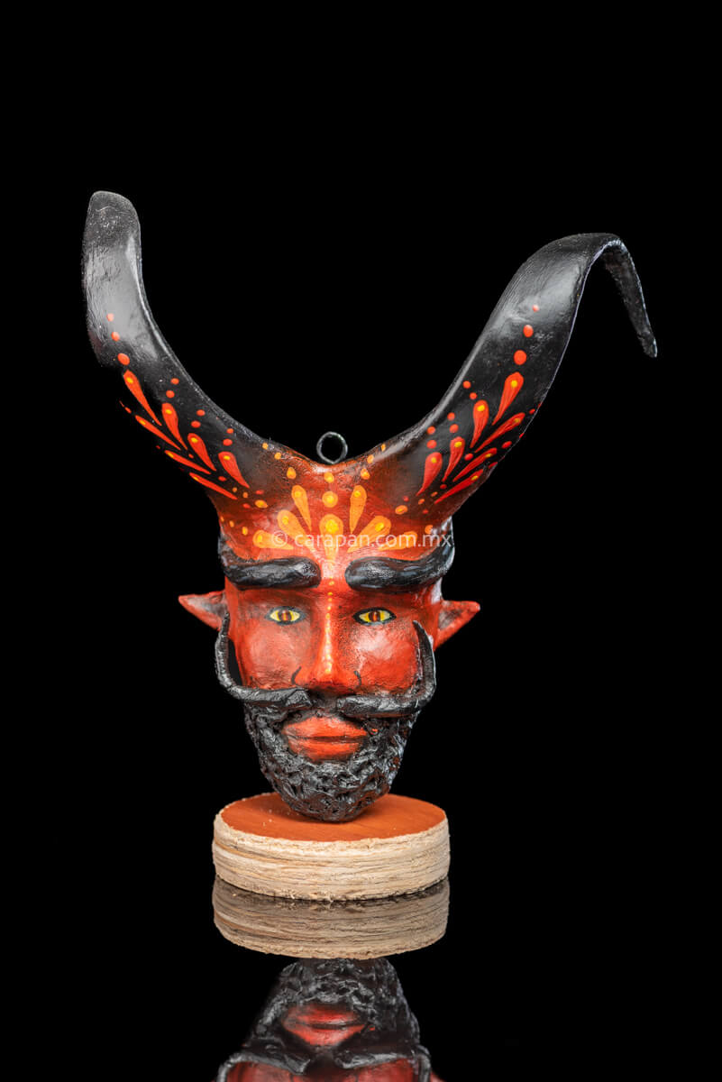 Paper Mache Mask with Beard, Moustache and Curved Black Horns Painted in red with orange strokes with base