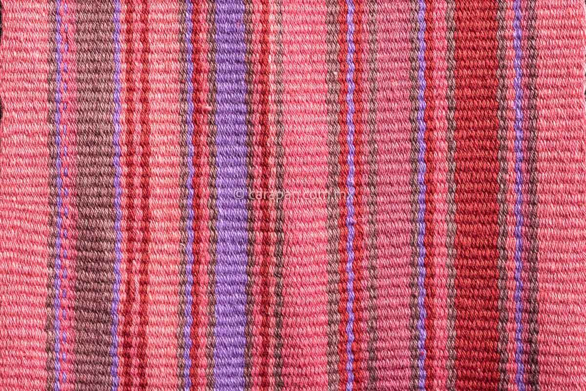 Purepecha indigenous textile belt in pink with brown, purple and red stripes it can be used as a scarf or table runner detail