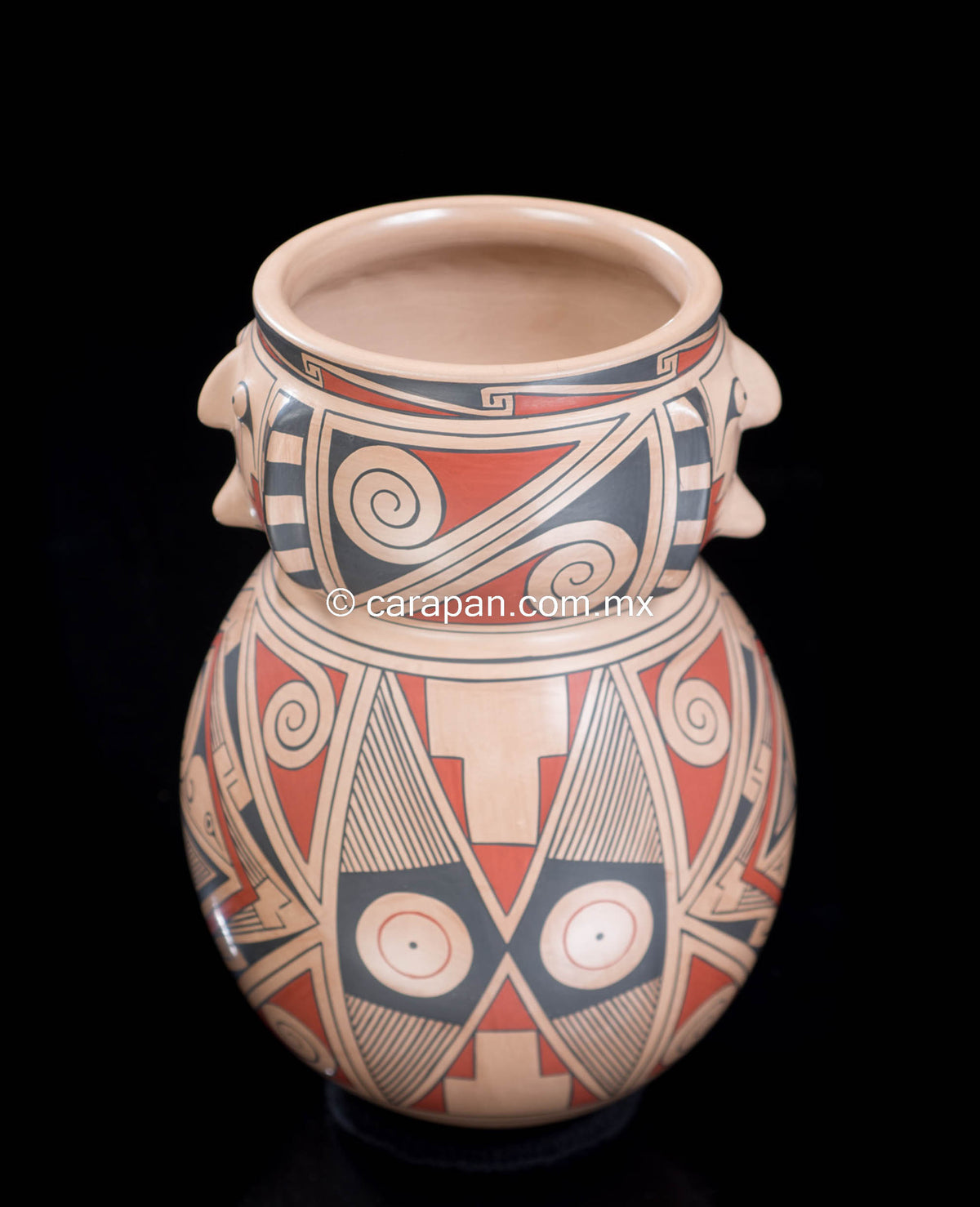 Mata Ortiz pot with human faces from Chihuahua Mexico