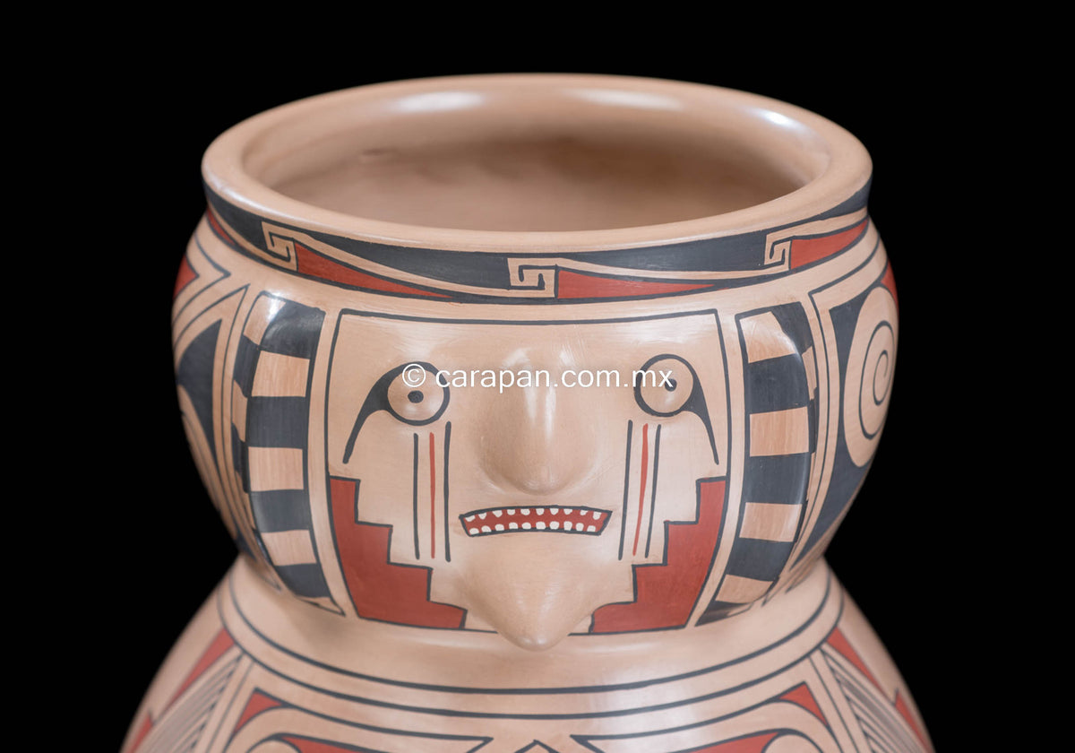 Mata Ortiz pot with human faces from Chihuahua Mexico