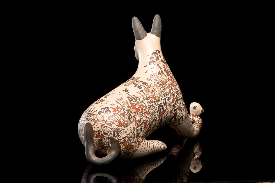 Clay coyote with dove sculpture from Guerrero Mexico