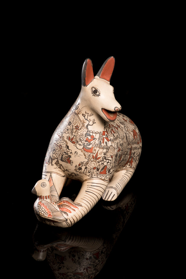 Clay coyote with dove sculpture from Guerrero Mexico