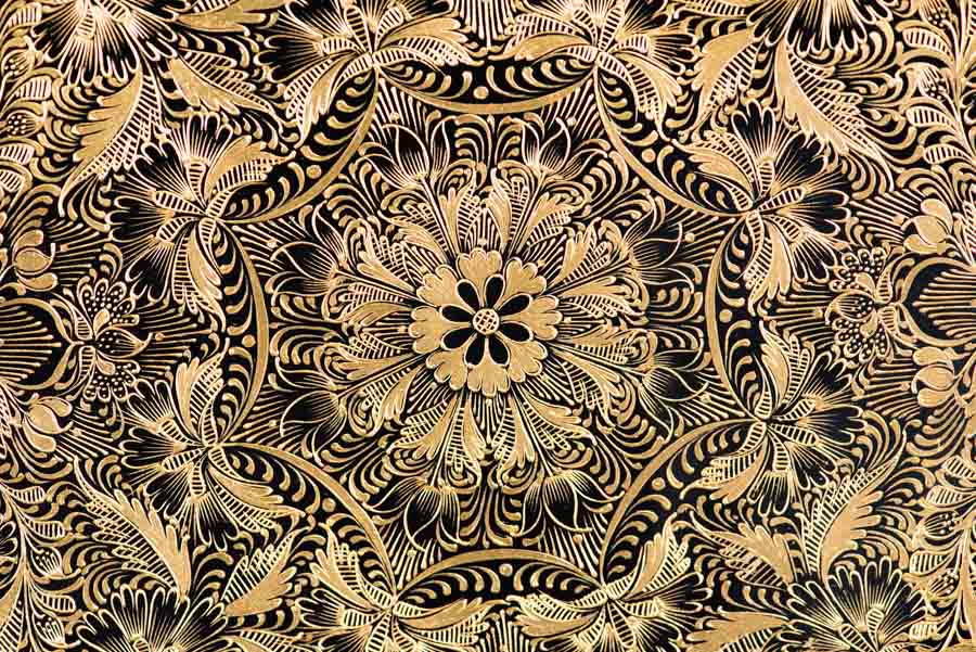 Detail of central floral geometric decoration of Gold Outlined Dish Lacquerware with geometric patterns. Folk Art from Patzcuaro.