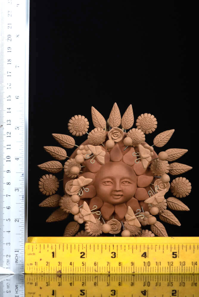 natural-clay-sun-sculpture