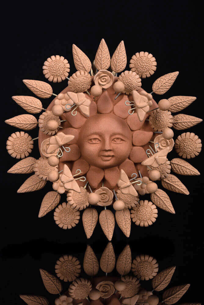 natural-clay-sun-sculpture